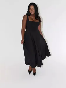 Elegant plus size black square neck sleeveless midi dress shown on a beautiful Asian model.