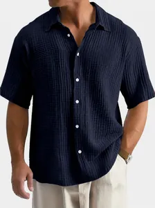 Casual men's short sleeve shirt in dark navy blue featuring unique seersucker texture