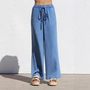 Κομψό γυναικείο παντελόνι tencel denim με ψηλή μέση, φαρδύ μπατζάκι και κορδόνι στη μέση