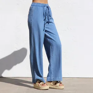 Γυναικείο ανοιχτό μπλε τζιν παντελόνι Tencel με φαρδύ μπατζάκι και κορδόνι μέσης
