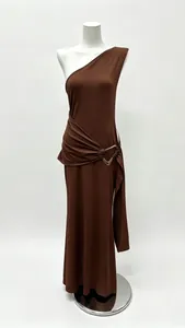 Elegant brown one-shoulder maxi dress with a triangular metal buckle and draped details.