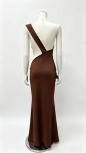 Rear view of an elegant brown one-shoulder backless maxi dress on a mannequin