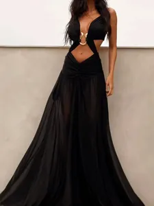 Elegant black halter cut-out maxi dress with metallic ring detail for vacation style