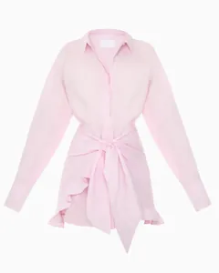 Detailed view of a stylish pink long-sleeved shirt dress with tie-waist and ruffle hem