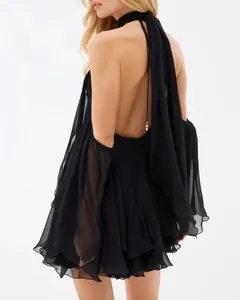Detailed back view of a sexy black chiffon halter neck dress with ruffled layers