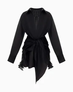 Elegant black long-sleeved shirt dress with tie-waist detail for a modern chic look.