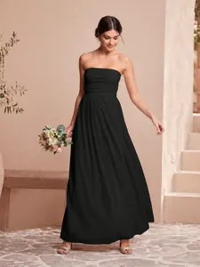 Elegant strapless black pleated maxi dress for evening gala or formal wedding events