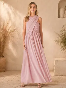 Elegant mauve pleated multi-way maxi dress with a criss-cross neckline and flowing skirt