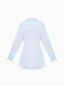 Back view of light blue slim fit long sleeve shirt dress with elegant ruffled hem