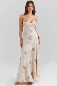 Full-length detail of cream floral jacquard maxi dress with slim shoulder straps
