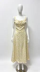 Detailed view of a floral camisole dress with waist-slimming fit and large swing skirt