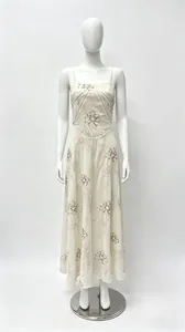 Elegant off-white floral sleeveless maxi dress with slim spaghetti straps and V-neck