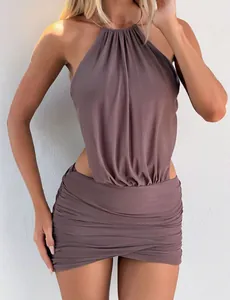 Close-up view of elegant mauve halter neck ruched mesh mini dress showing textured fabric