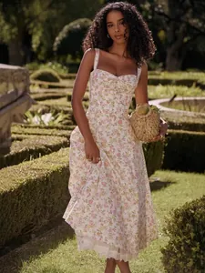 Elegant floral print suspender midi dress with a sweetheart neckline and flared hem.