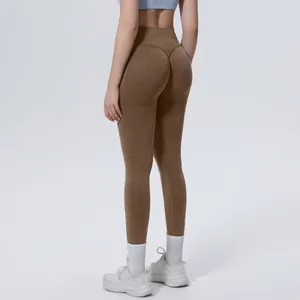 Back view detail of high-waisted seamless washed yoga leggings with booty lift