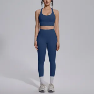 Navy blue nylon seamless sports set with scoop neck bra and high-waisted leggings