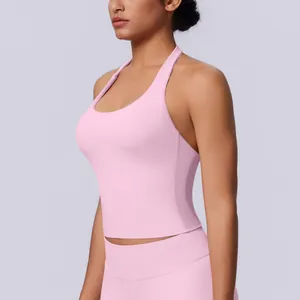 Side view detail of a pink seamless halter neck sports tank top for yoga and fitness