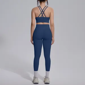 Premium navy blue cross-back sports bra and high-waisted leggings yoga set back view
