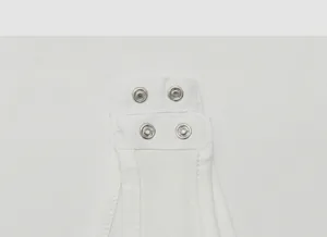Close-up of snap button closure at crotch for easy wear
