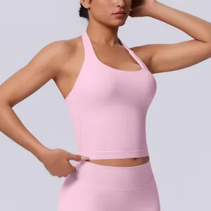 Detailed view of a seamless pink halter sports bra for women yoga fitness and gym training.