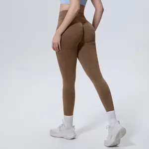 Detailed back view of brown high-waisted seamless yoga leggings with butt-lifting effect