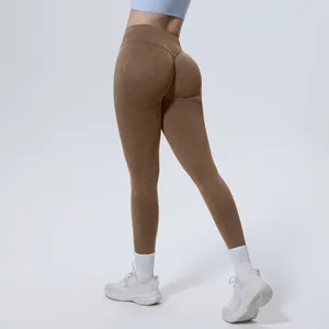 Detail view of high-waisted seamless washed yoga leggings with butt-lifting design for fitness