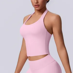 Close-up detail of a pink seamless halter-neck sports bra for yoga and fitness gym