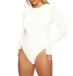 Detailed shot of a sleek white long-sleeve bodysuit featuring a snug fit and round neck
