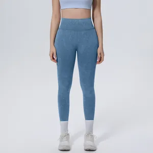 Detailed full-length view of blue washed high-waist seamless yoga leggings on a model