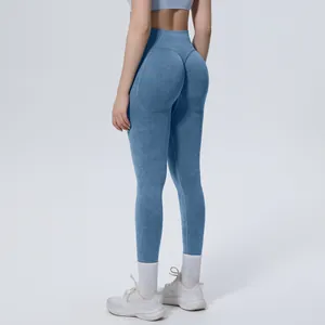 Back view of seamless blue washed yoga leggings with high waist and butt lift effect