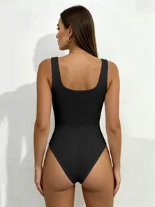 Elegant back view of a classic black sleeveless bodysuit leotard for women outfit
