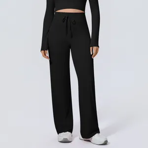 Gesamtansicht der schwarzen Yoga-Hose mit hohem Bund, weitem Bein und Kordelzug.