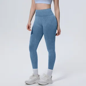 Detail shot of blue washed seamless high-waist yoga leggings showing fit and texture.