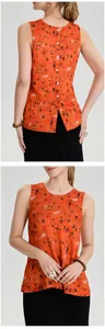 Vista dettagliata fronte e retro di un gilet da yoga arancione con motivi jacquard retrò.