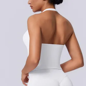Detailed back view of a white seamless halter neck sports tank top on a fitness model