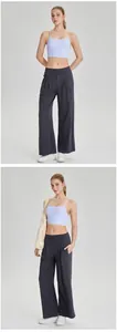 Front and side view of lavender yoga sports bra and dark grey wide-leg fitness pants