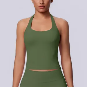 Close-up of a seamless dark green halter neck sports tank top for women's fitness.