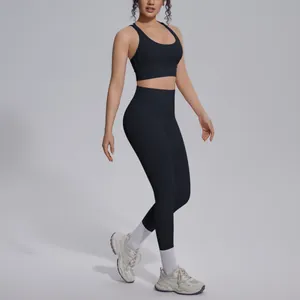 Professional full body view of a black high-waisted yoga set for running and fitness training