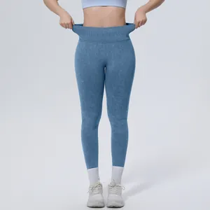 High-waisted seamless washed yoga leggings showing elastic waistband detail on model