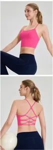 Close-up detail showing the criss-cross back design of this pink breathable sports bra top