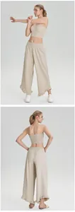 Haut de yoga bandeau rembourré et pantalon large à volants de couleur beige neutre