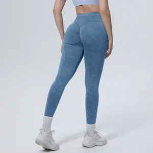 Back view of high-waisted seamless washed blue yoga leggings with scrunch butt effect