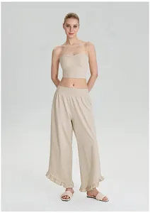 Volledig overzicht van de losse casual broek met wijde pijpen voor dames met ruches