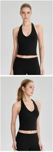 Vues de face et de profil d'un gilet de sport noir à licou pour le yoga et le pilates