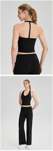 Vues détaillées avant et arrière d'un débardeur de yoga noir rembourré pour femmes