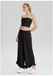 Zomerse zwarte broek met wijde pijpen voor dames met ruches en bijpassende bandeau-top
