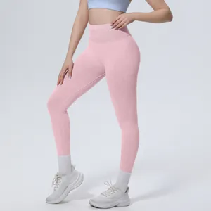 High waisted pink seamless washed yoga leggings with tummy control for fitness women.