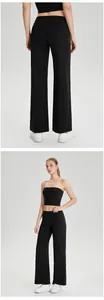 Vista completa y trasera de los pantalones de yoga negros de pierna ancha para mujer