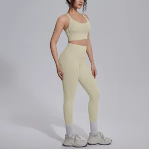 Full body side view of cream double-sided nylon yoga set with high waist leggings