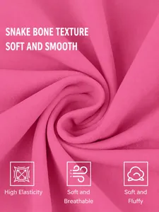 Premium pink sports bra fabric detail showing soft snake bone texture and cloud-feel finish